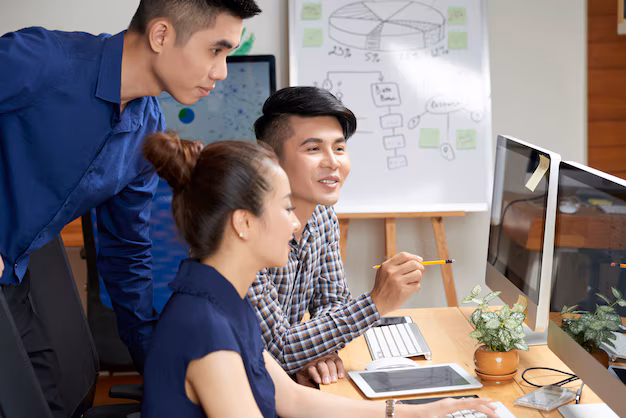 asian-business-team-discussing-project_1098-21546